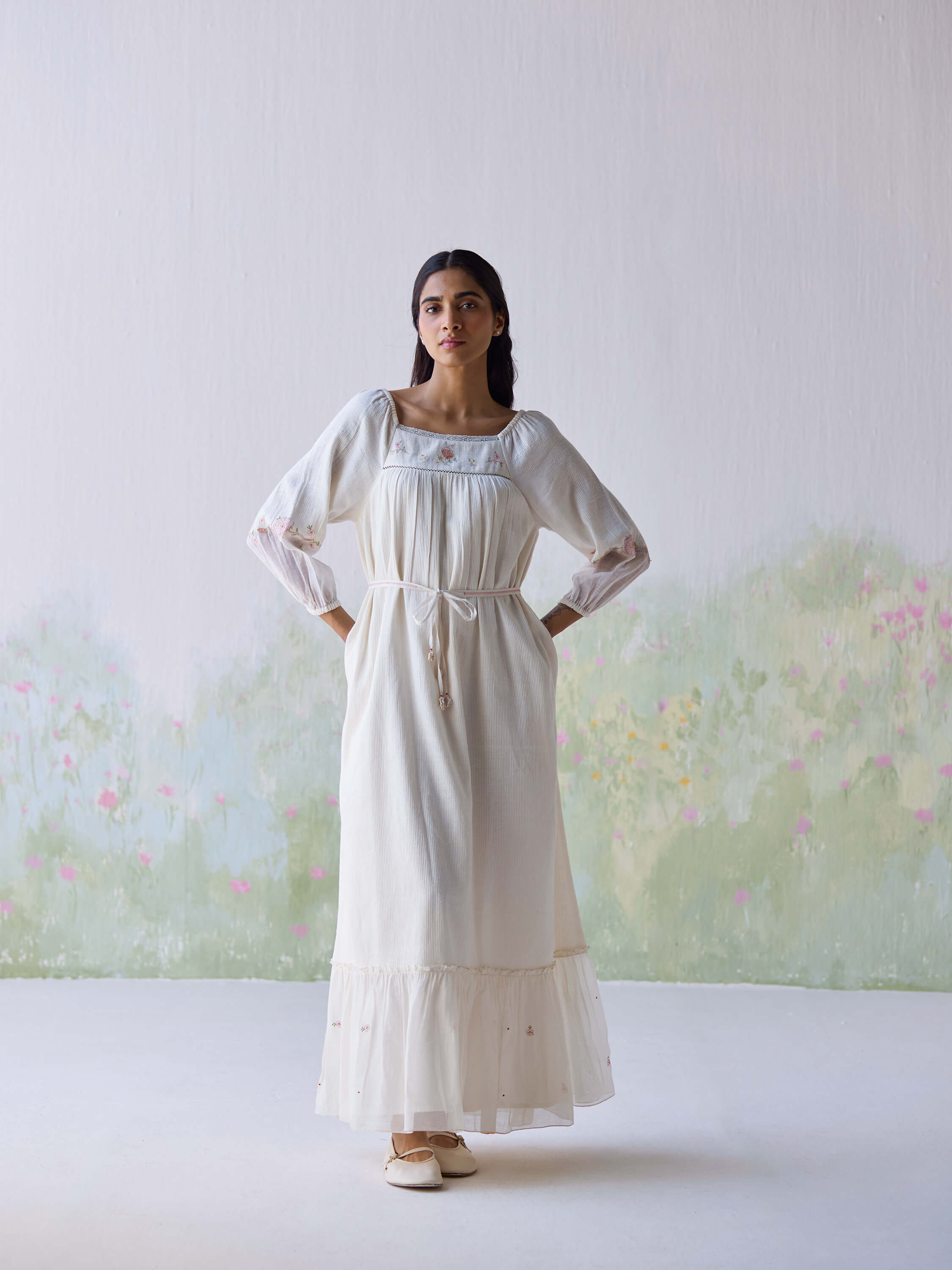 Elegant Belle Maxi Dress with floral embroidery against a soft background.