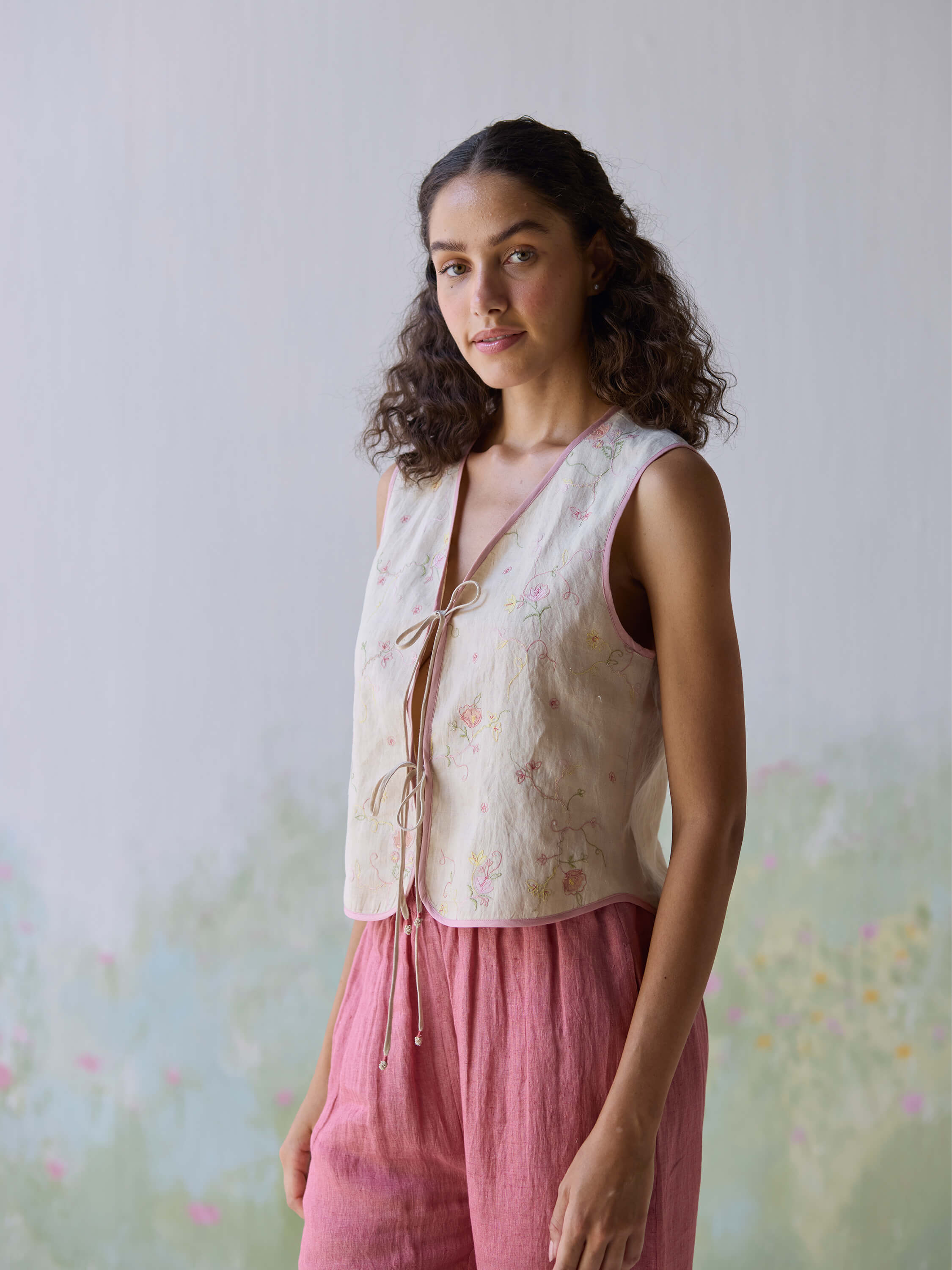 Stylish Fanfare Linen Gilet with floral embroidery, perfect for summer wear.