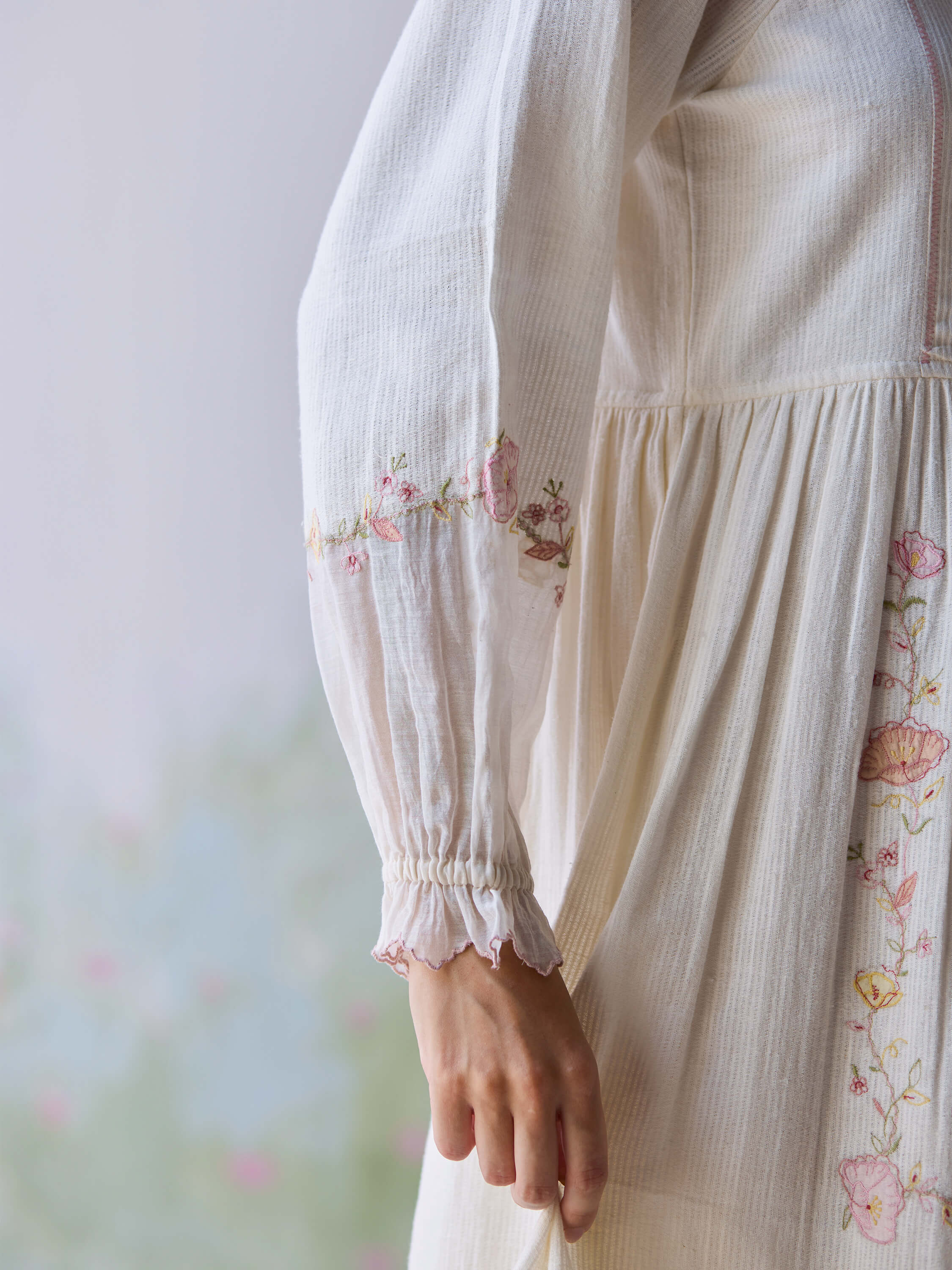 Embroidered sleeve detail of the Verona Midi Dress in soft fabric.